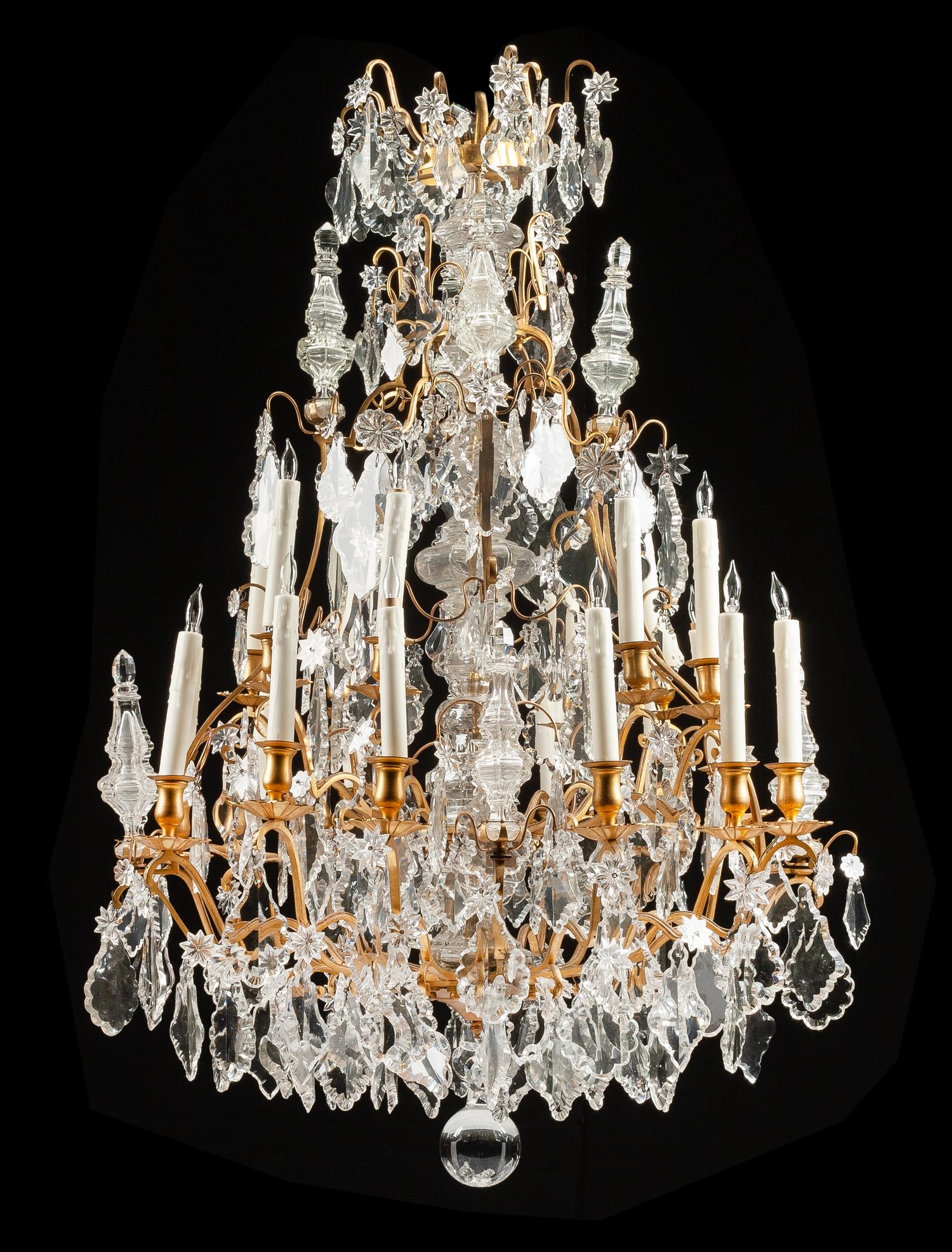A Louis XV Style Gilt Bronze Eighteen-Light Chandelier Height 51 inches. — 19TH CENTURY