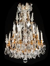 A Louis XV Style Gilt Bronze Eighteen-Light Chandelier Height 51 inches. — 19TH CENTURY