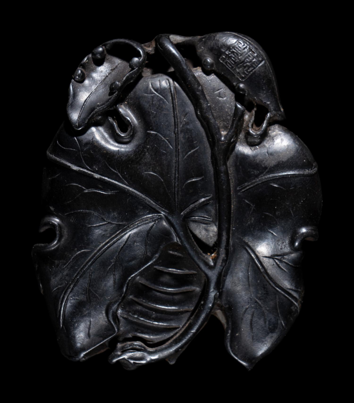 Two Chinese Carved Wood Pendants