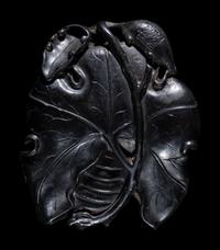 Two Chinese Carved Wood Pendants
