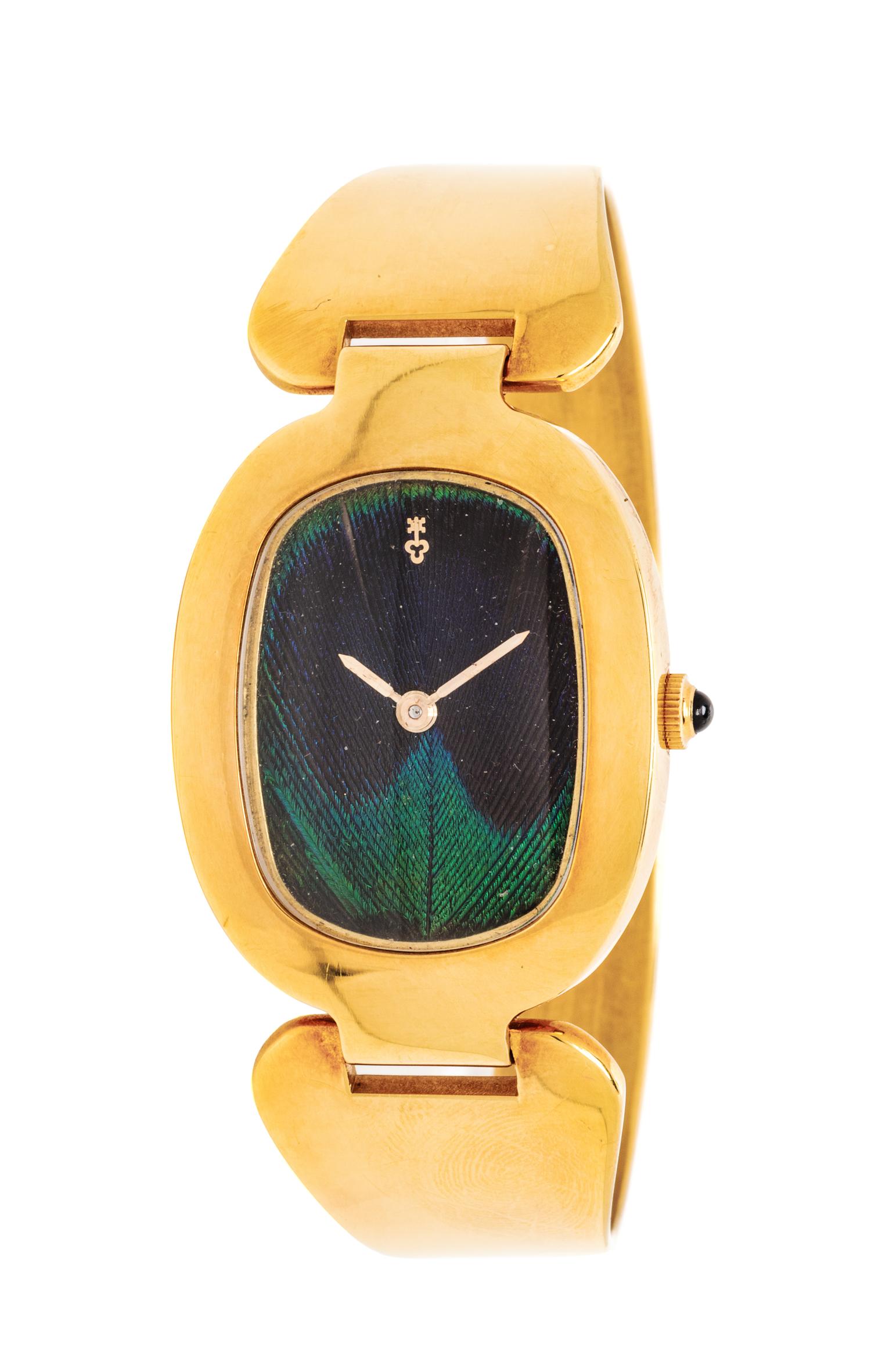An 18 Karat Yellow Gold and Peacock Feather 'Love Bond' Bangle Watch, Corum, 49.90 dwts.
