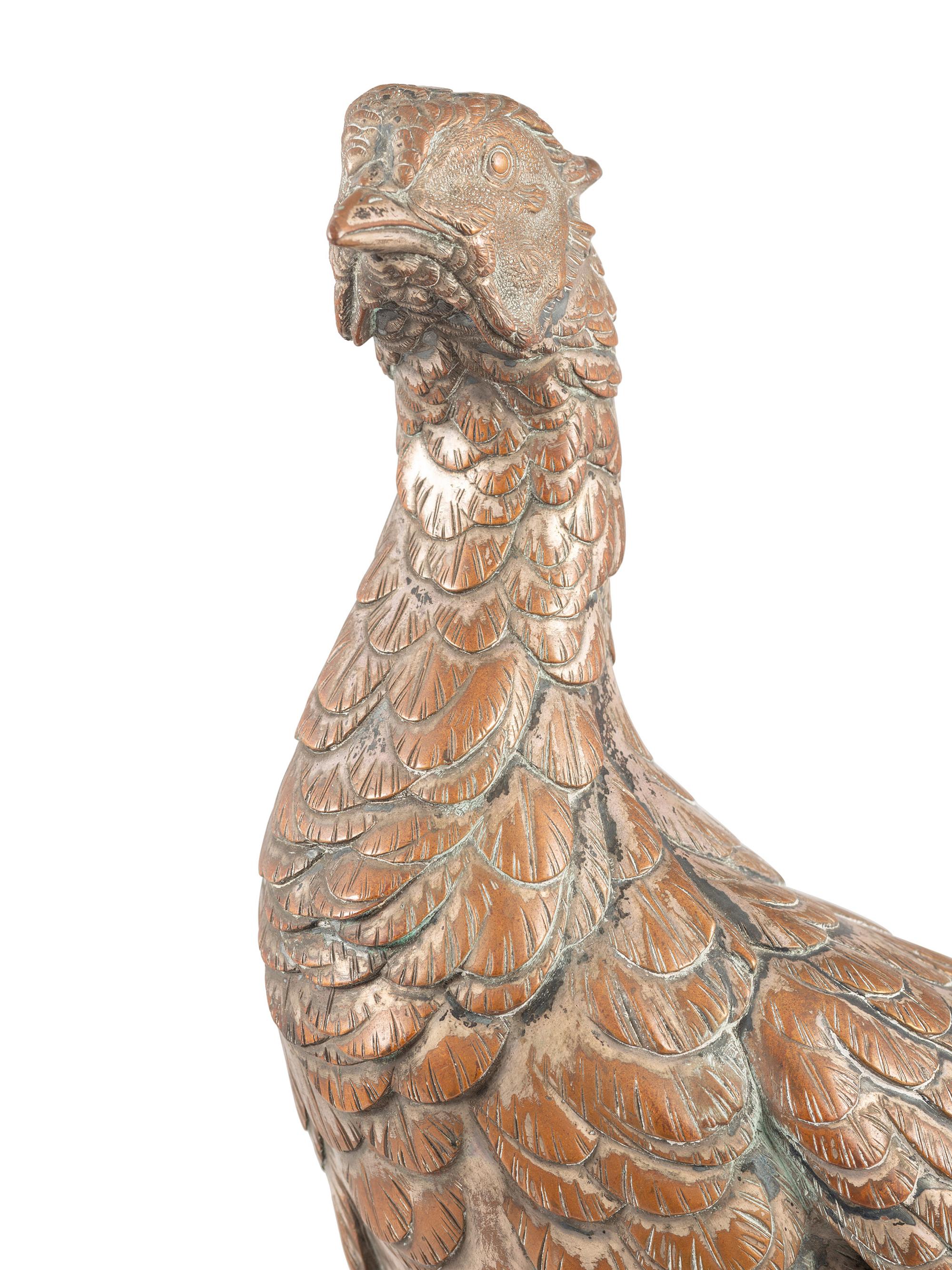 A Silvered Bronze Pheasant on a Wood Stand