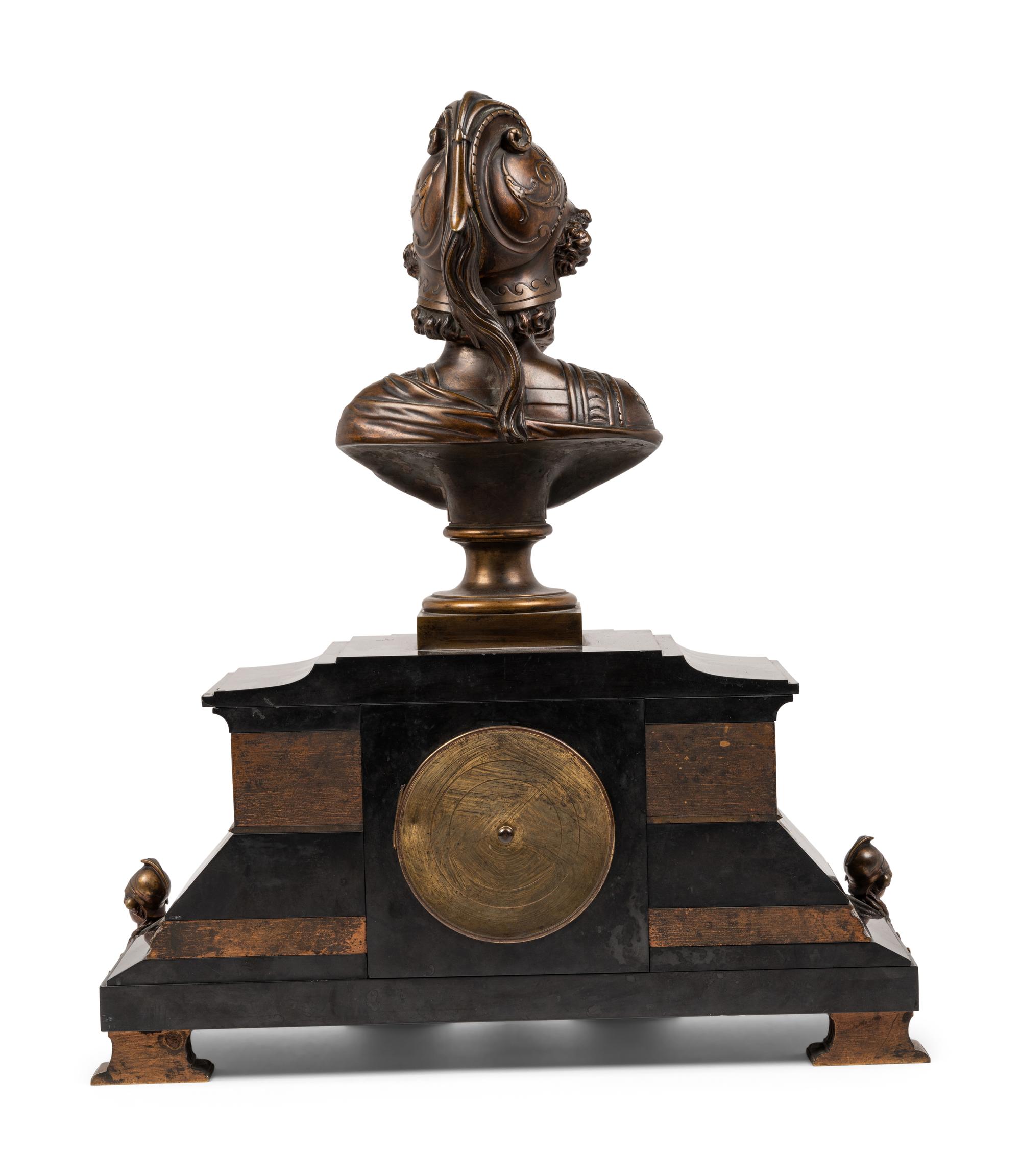 A French Gilt Bronze and Black Marble Mantel Clock