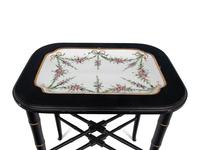 A German Porcelain Tray Set in a Later Ebonized Side Table
