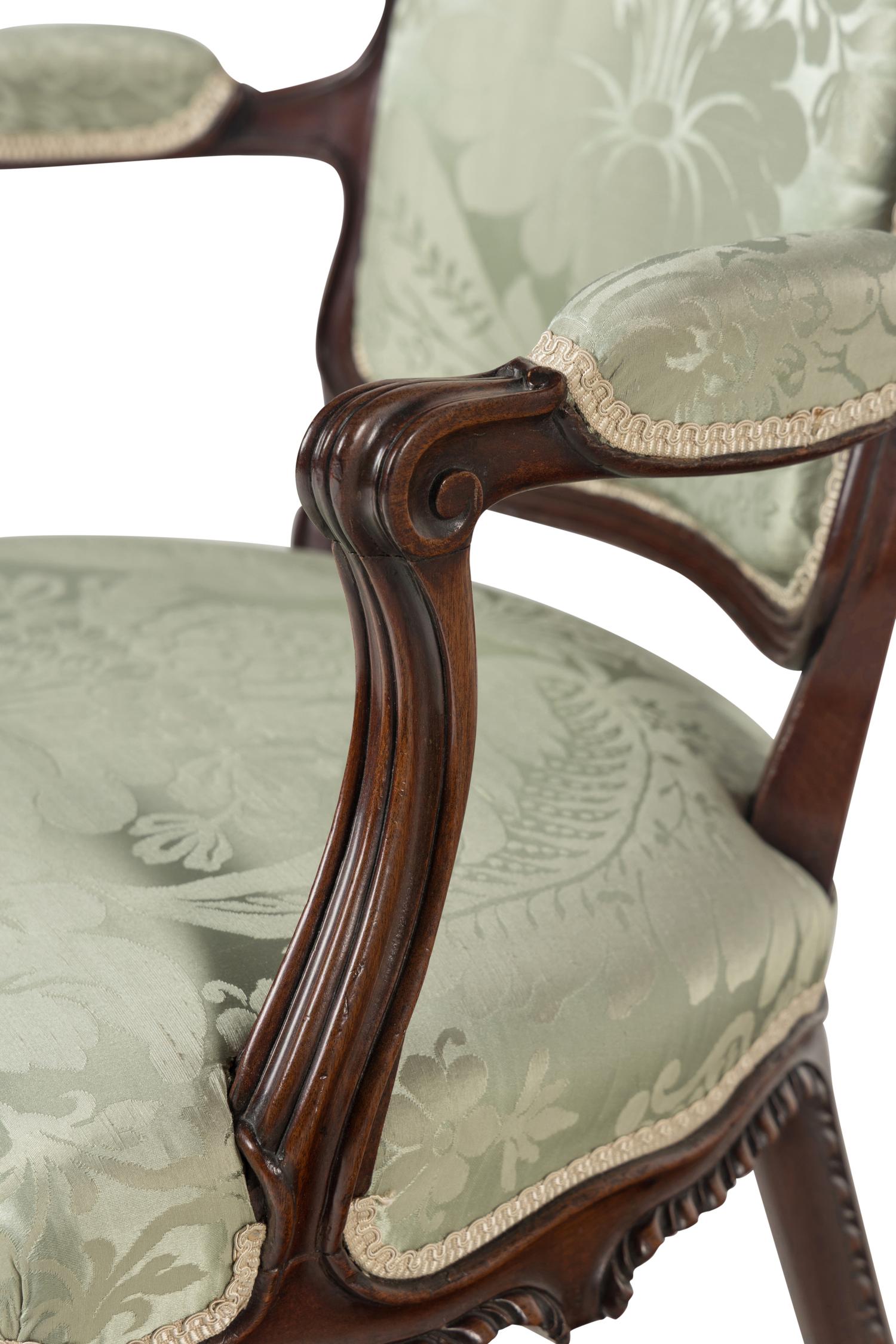 A Pair of George III Solid Mahogany Armchairs