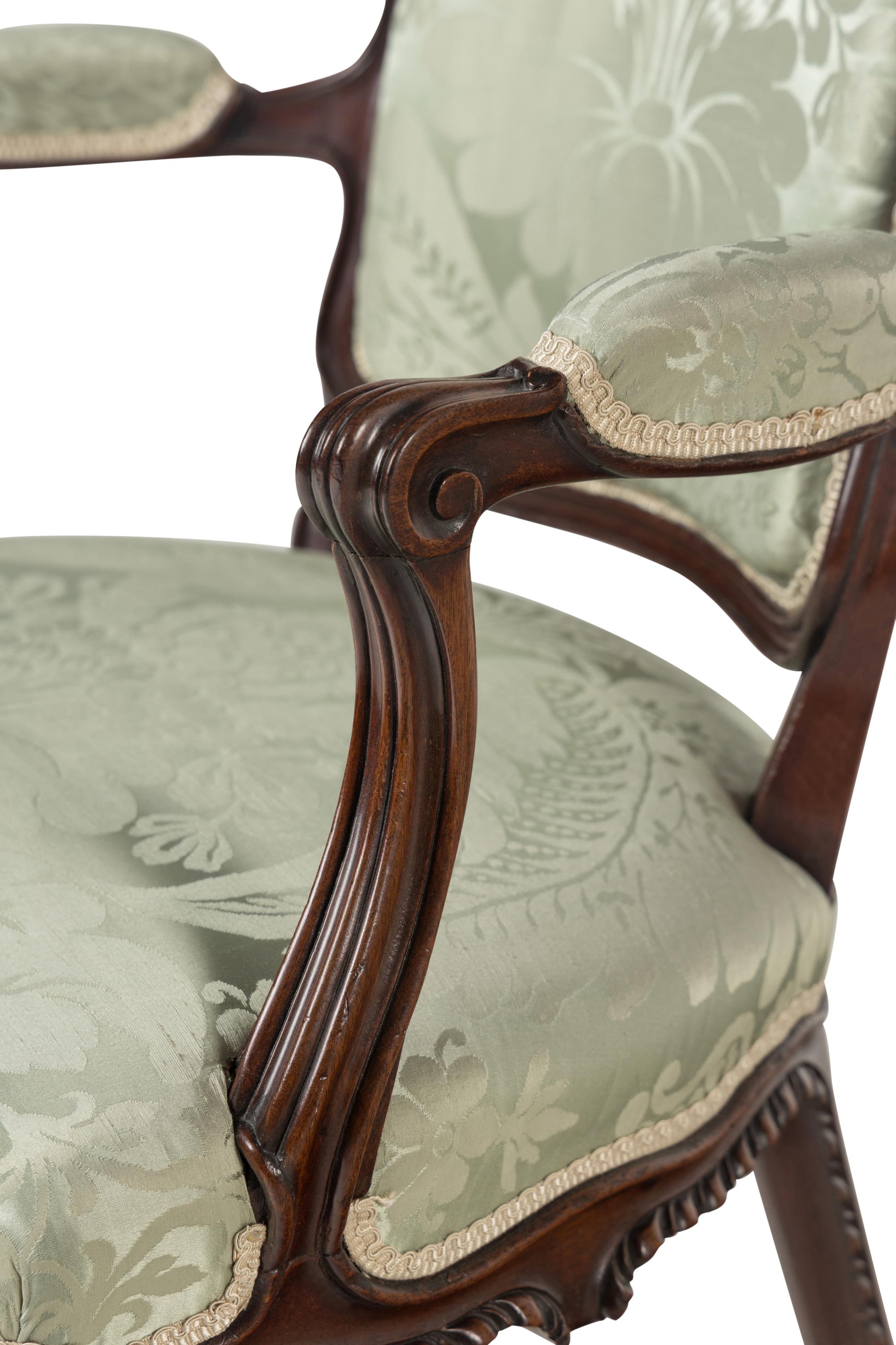 A Pair of George III Solid Mahogany Armchairs