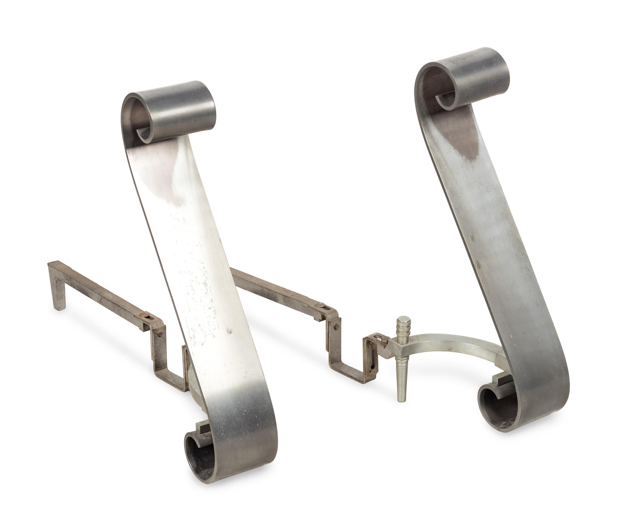 A Pair of Modernist Steel Scroll Andirons