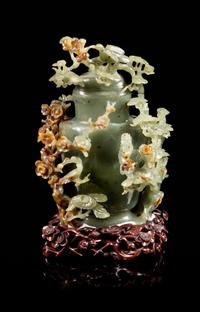 A Spinach and Russet Jade Covered Vase Height 6 1/2 inches. — 20TH CENTURY