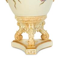 A Rudolstadt Painted and Parcel Gilt Porcelain Lidded Urn