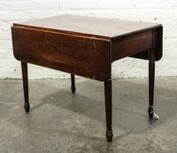 An American Walnut Drop Leaf Table Height 20 x width 32 1/2 x depth 28 inches (open). — 19TH CENTURY