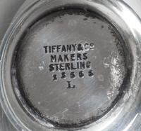 A Pair of American Silver Ring Trays, Tiffany & Co., New York, NY, each formed as a circular dish with a modernist hand rising from the