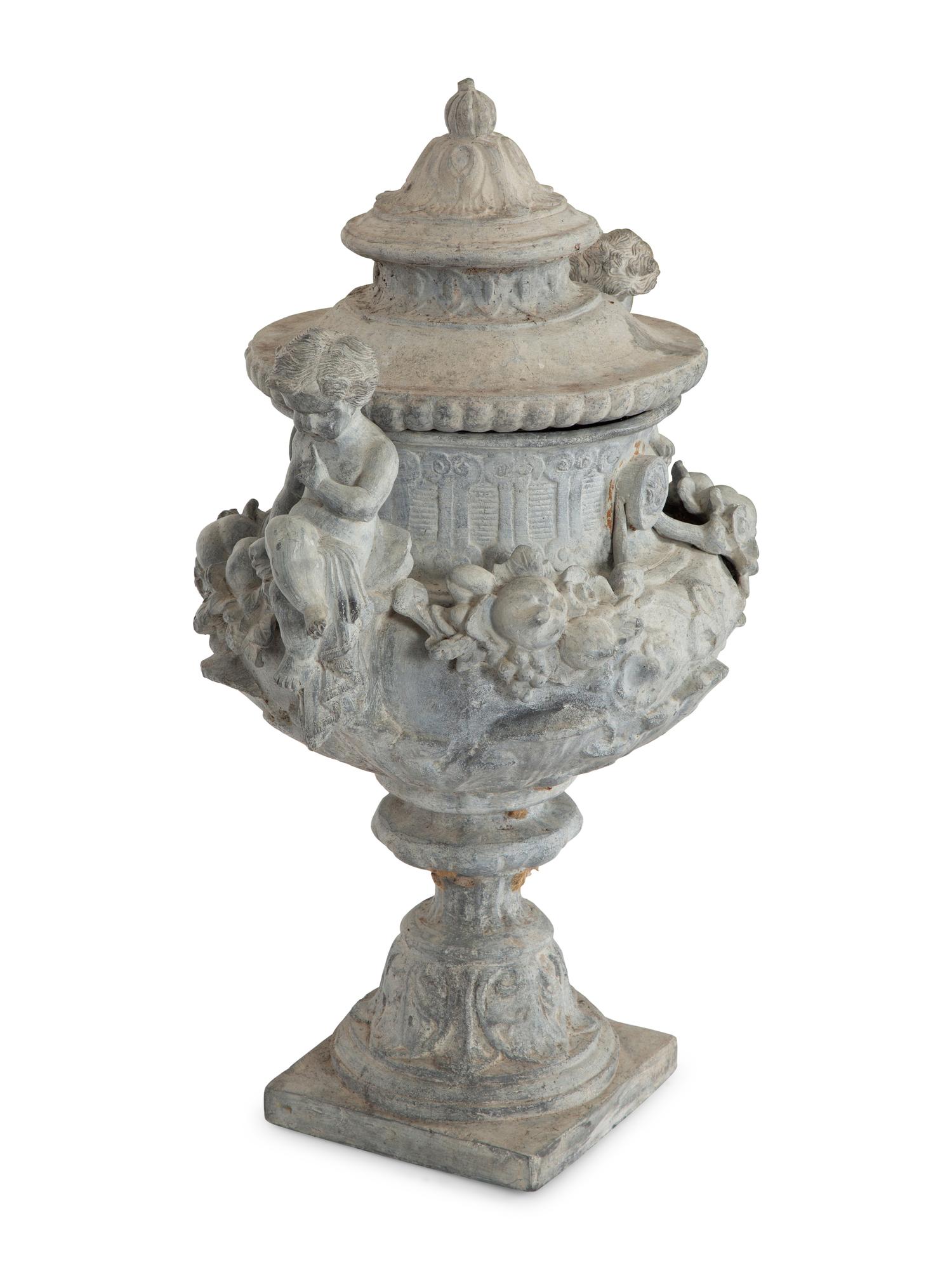 A Pair of Classical Style Cast Stone Covered Urns