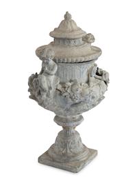 A Pair of Classical Style Cast Stone Covered Urns