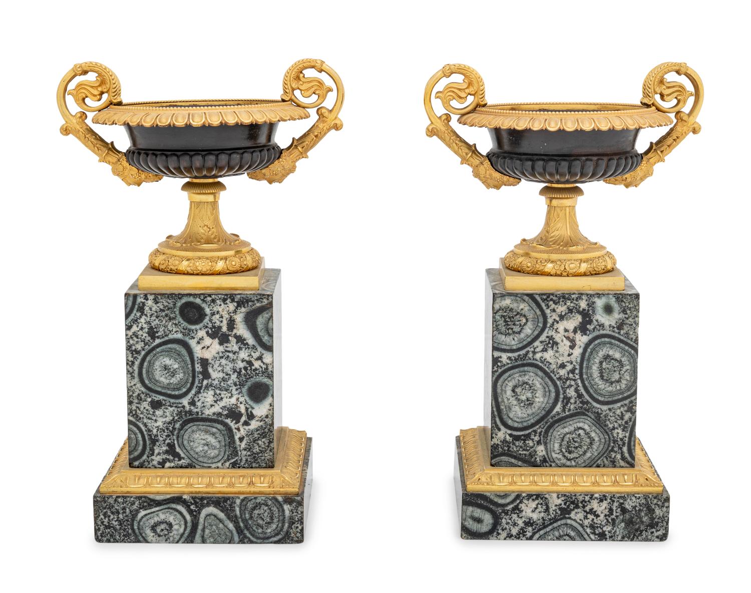 A Pair of Restauration Gilt and Patinated Bronze and Granite Urns