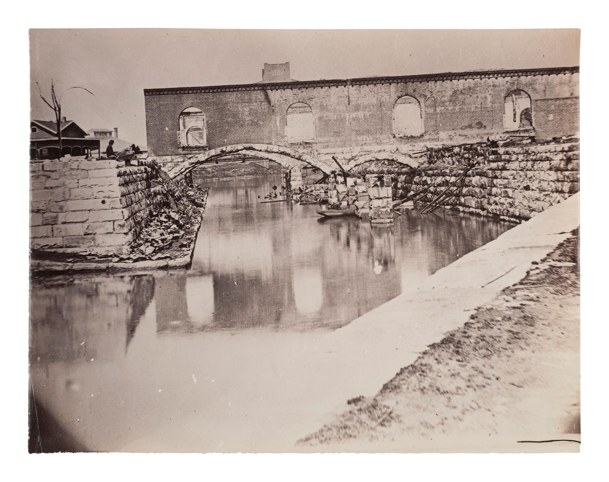 [CIVIL WAR]. GARDNER, Alexander (1821-1882). Canal and Ruins of Richmond and Danville Railroad Depot, Richmond, Virginia. 1865.