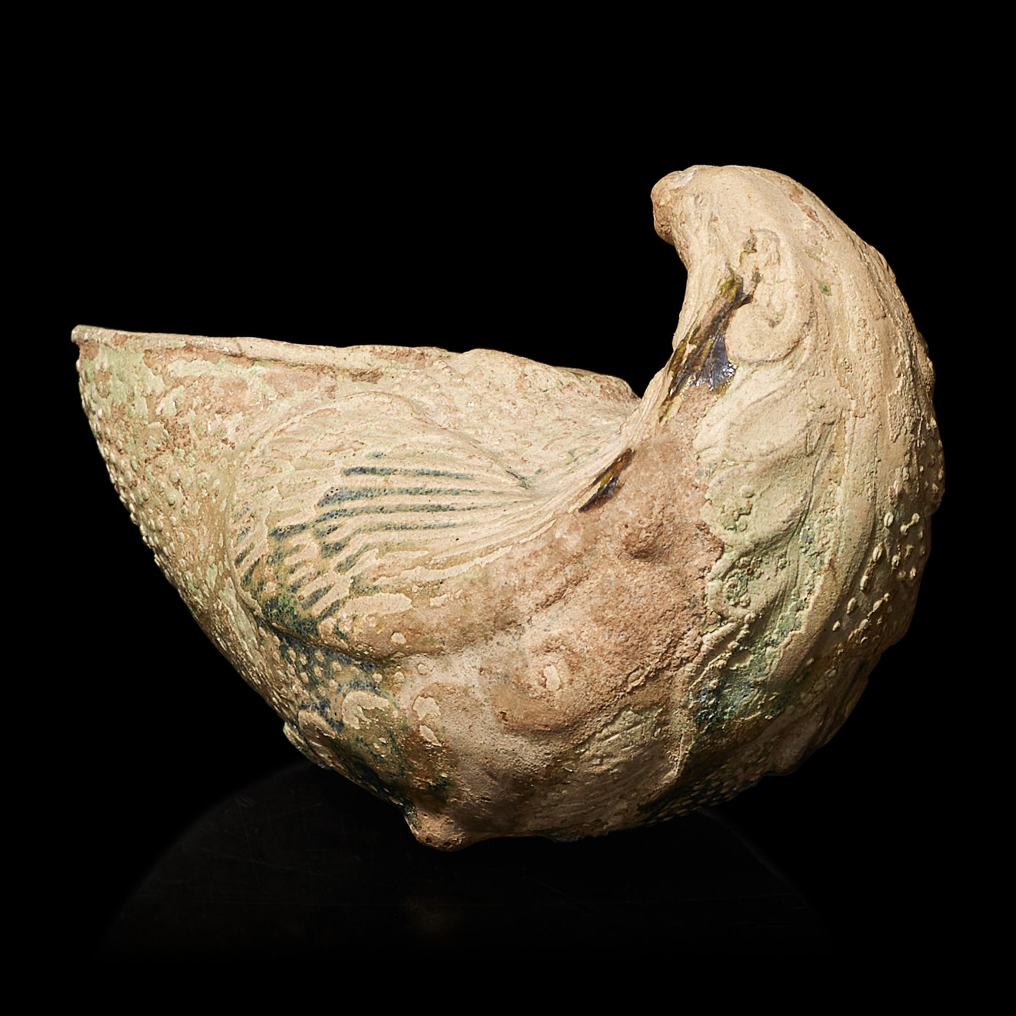 A Chinese Green Glazed Pottery 'Parrot' Rhyton Cup, Tang Dynasty 唐 綠釉鸚鵡杯