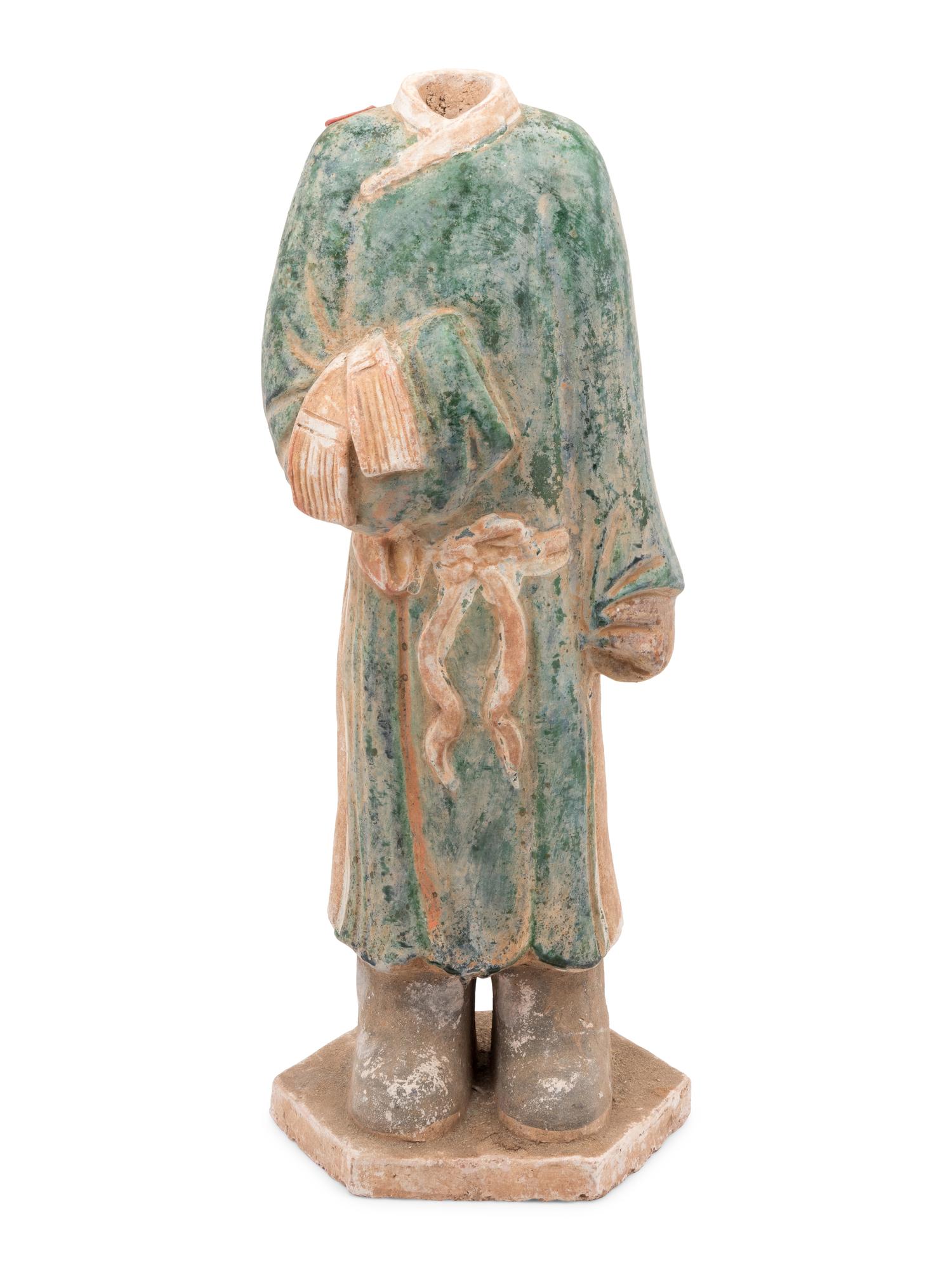 A Chinese Polychrome Decorated Terra Cotta Standing Figure