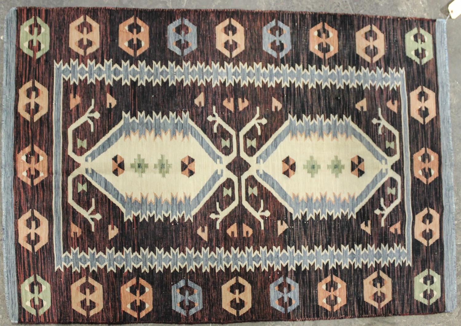 A Flatweave Kilim 5 feet 10 x 3 feet 11 inches. — 20TH CENTURY