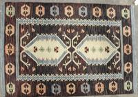 A Flatweave Kilim 5 feet 10 x 3 feet 11 inches. — 20TH CENTURY