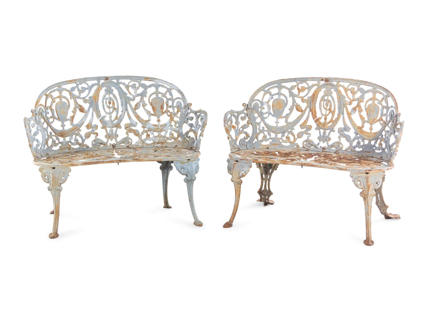 A Pair of Painted Iron Garden Benches