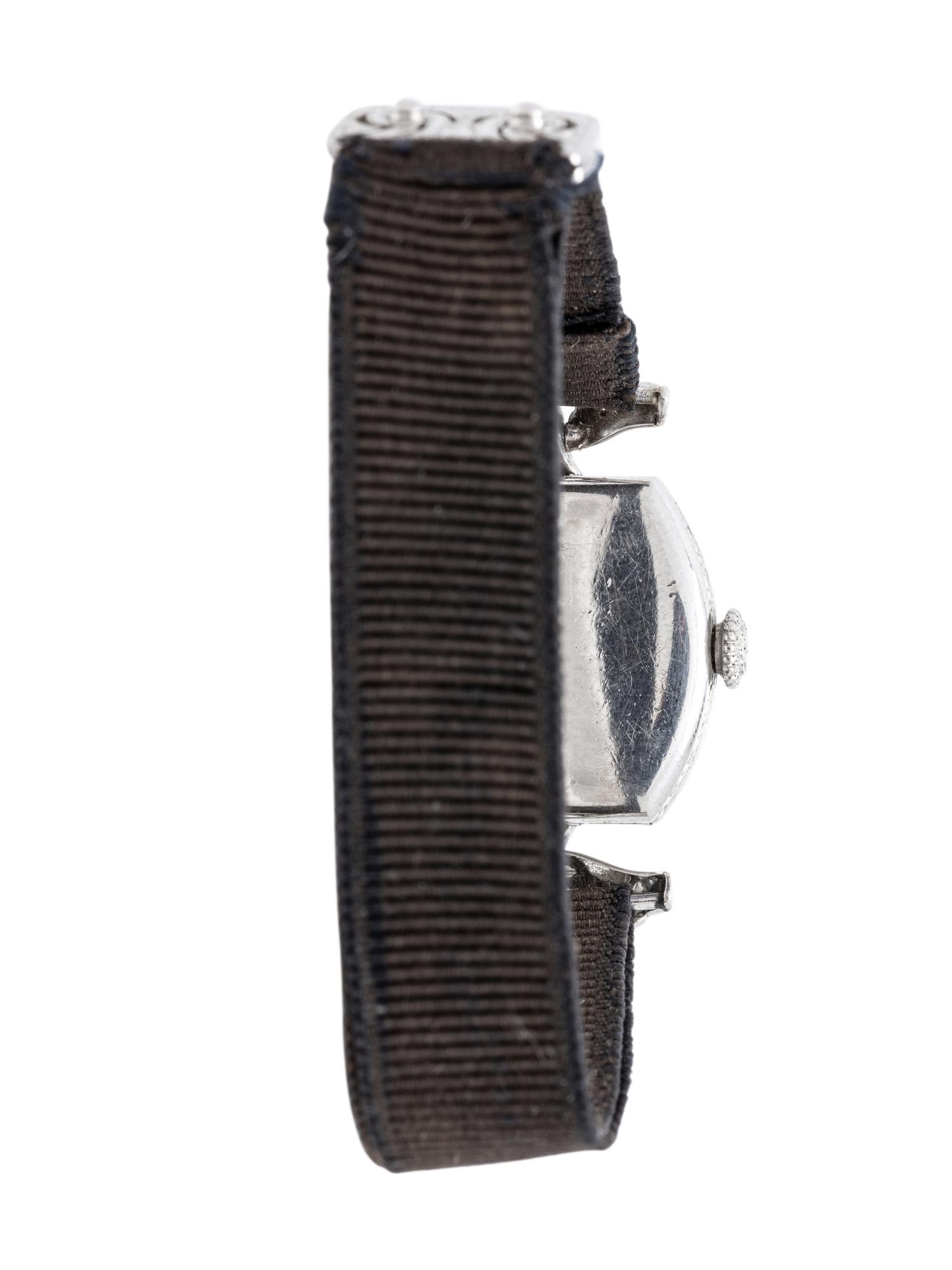 TIFFANY & CO., ART DECO, PLATINUM AND DIAMOND WATCH