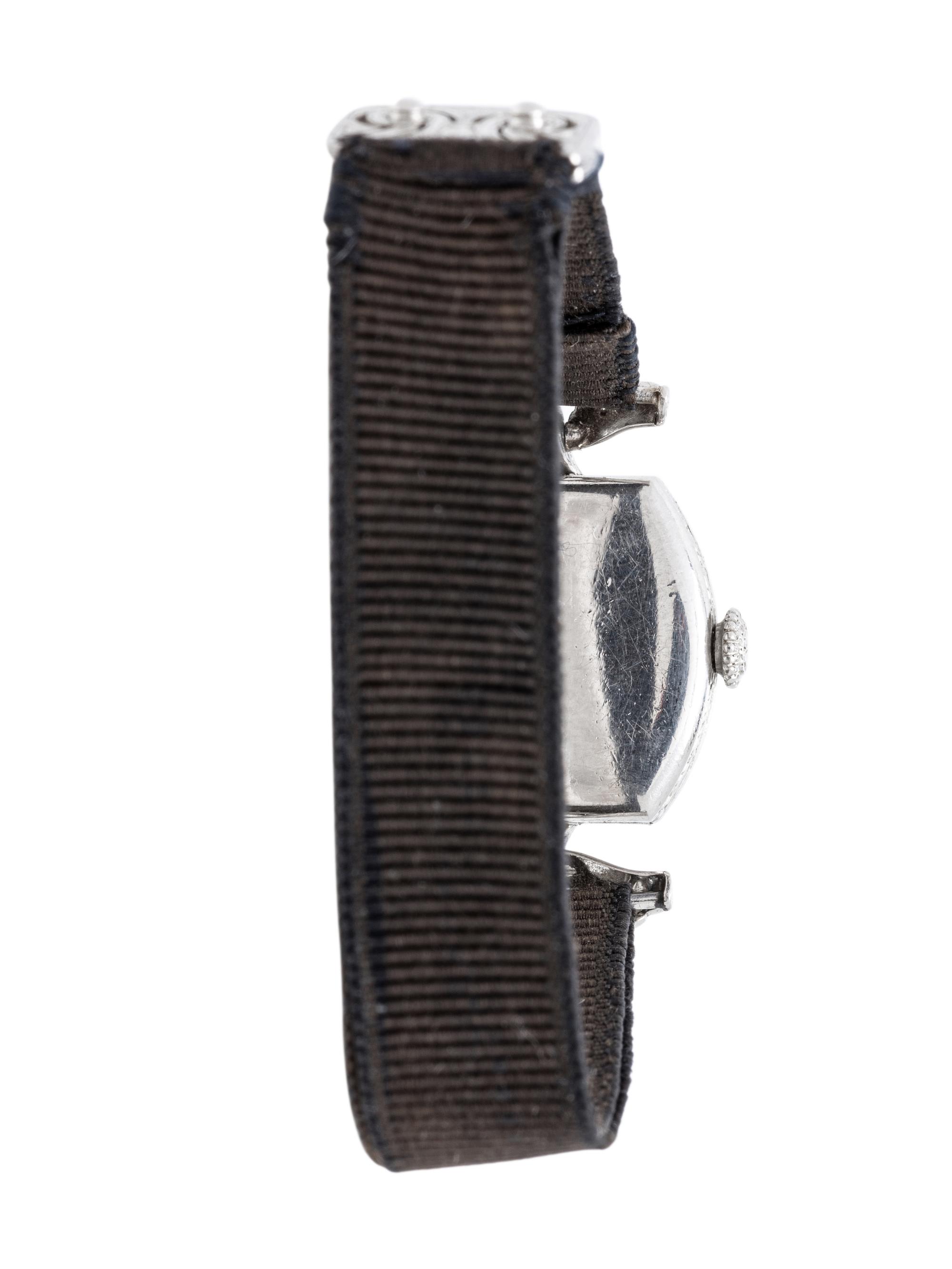 TIFFANY & CO., ART DECO, PLATINUM AND DIAMOND WATCH