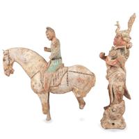 A Chinese Terracotta Equestrian Figure and a Standing Warrior with Lion