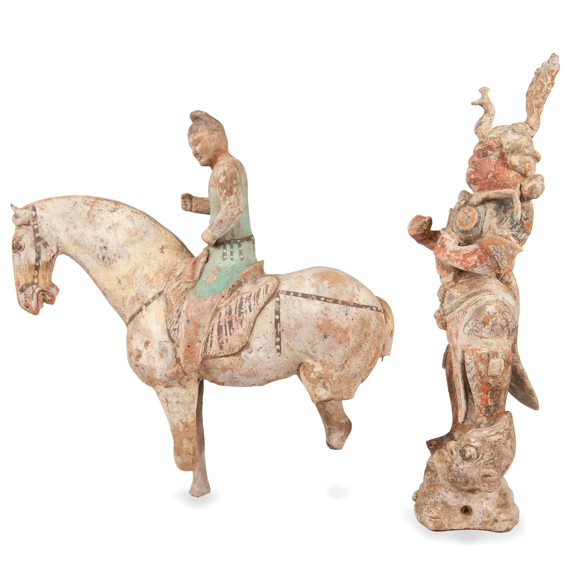 A Chinese Terracotta Equestrian Figure and a Standing Warrior with Lion