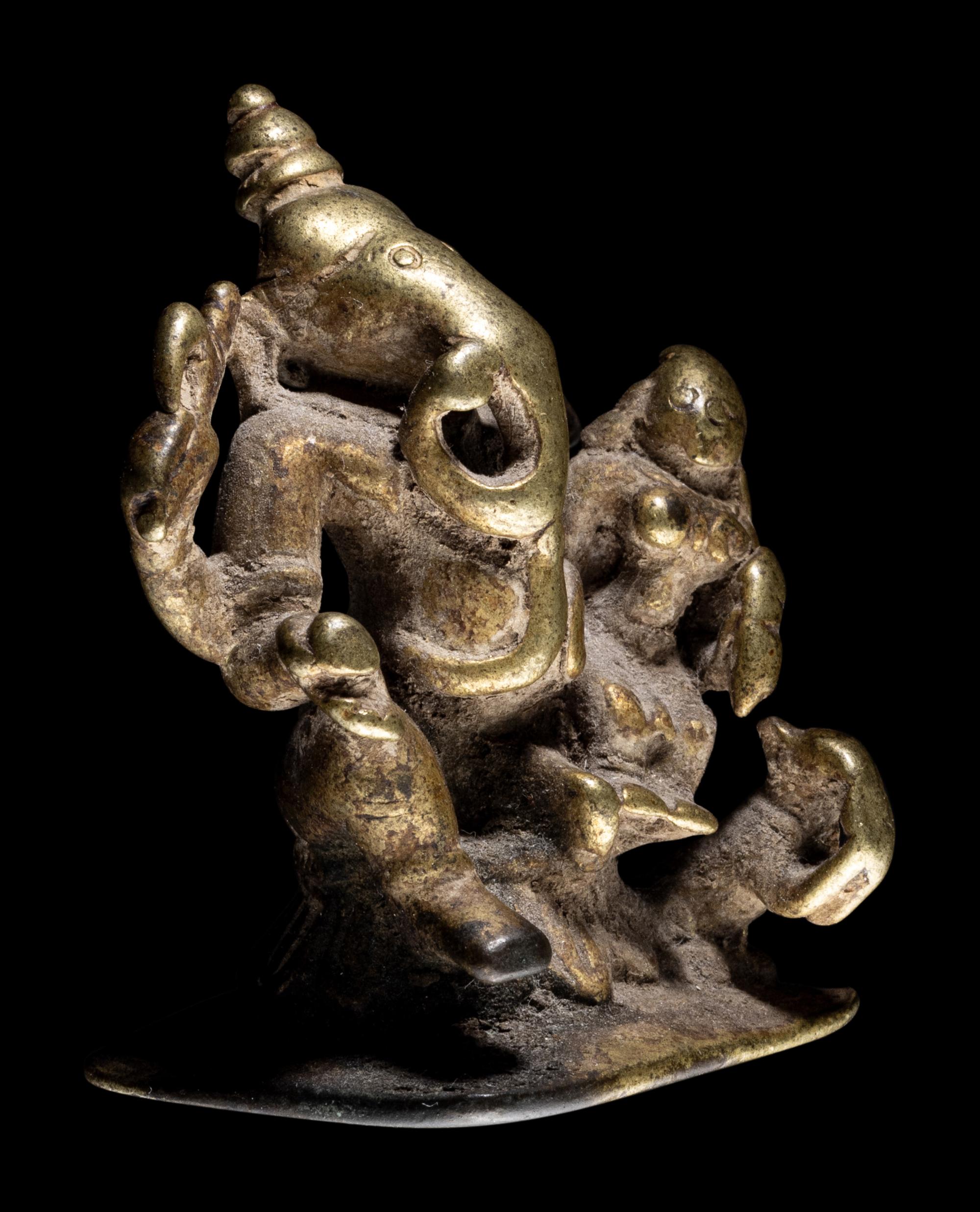 A Small Indian Brass Figural Group of Ganesha and Shakti
