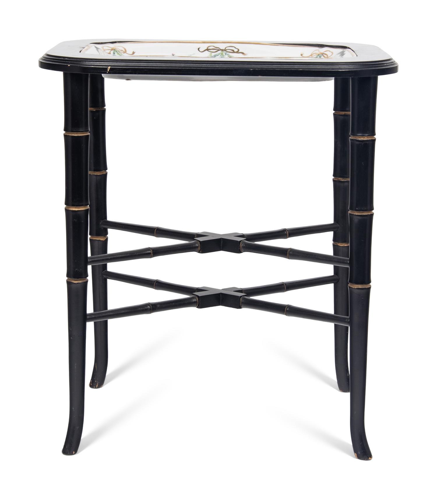 A German Porcelain Tray Set in a Later Ebonized Side Table