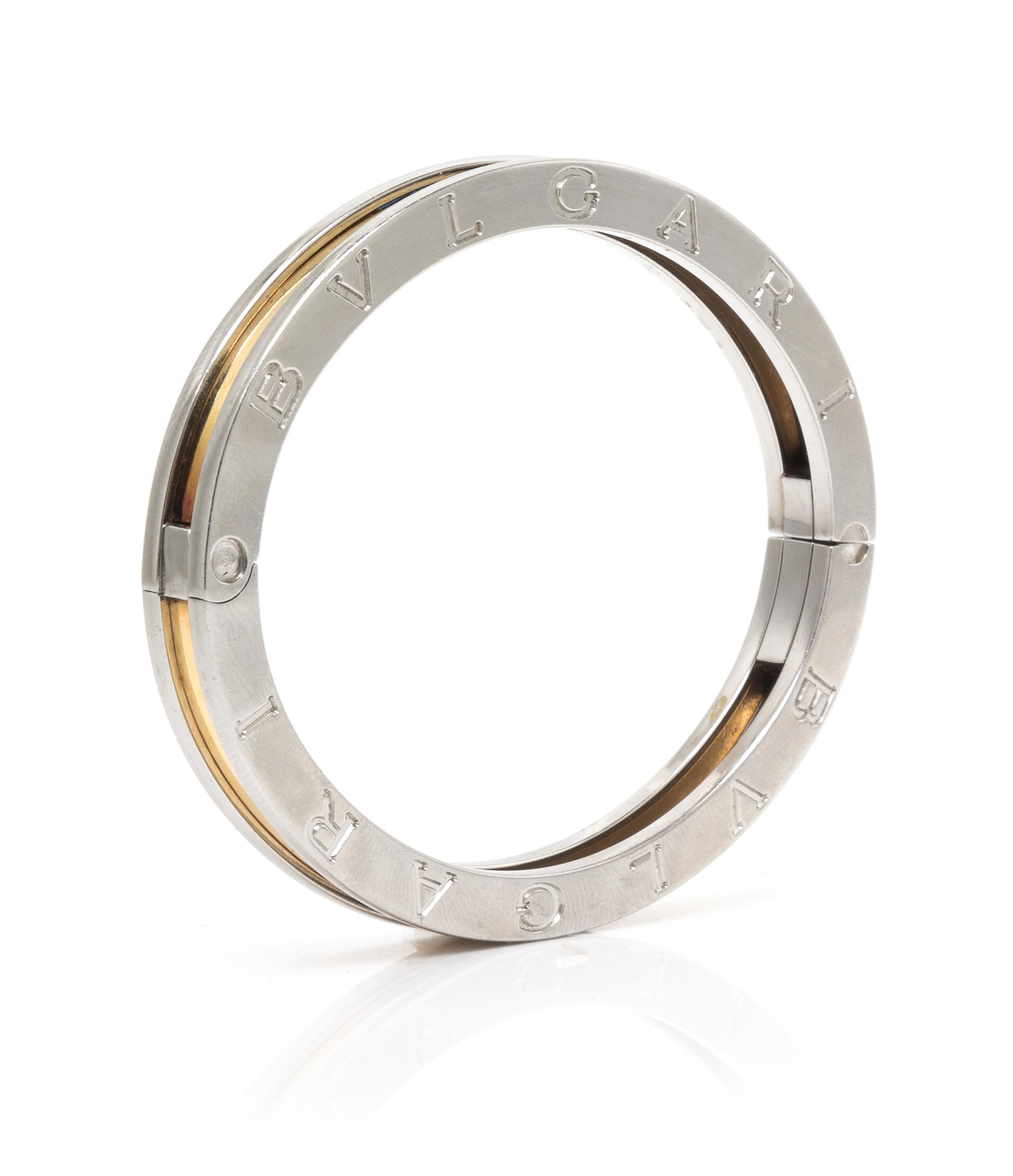 An 18 Karat Yellow Gold and Stainless Steel Bangle Bracelet, Bulgari, 17.30 dwts.