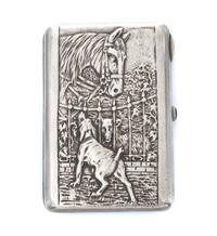 A Russian Silver Cigarette Case, Maker's Mark Cyrillic CF, obscured Artel mark, Moscow, the lid worked to show a dog, horse and sheep a