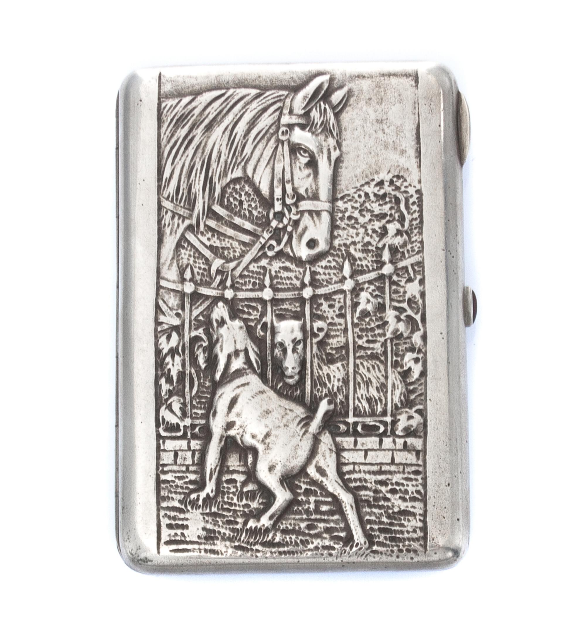 A Russian Silver Cigarette Case, Maker's Mark Cyrillic CF, obscured Artel mark, Moscow, the lid worked to show a dog, horse and sheep a