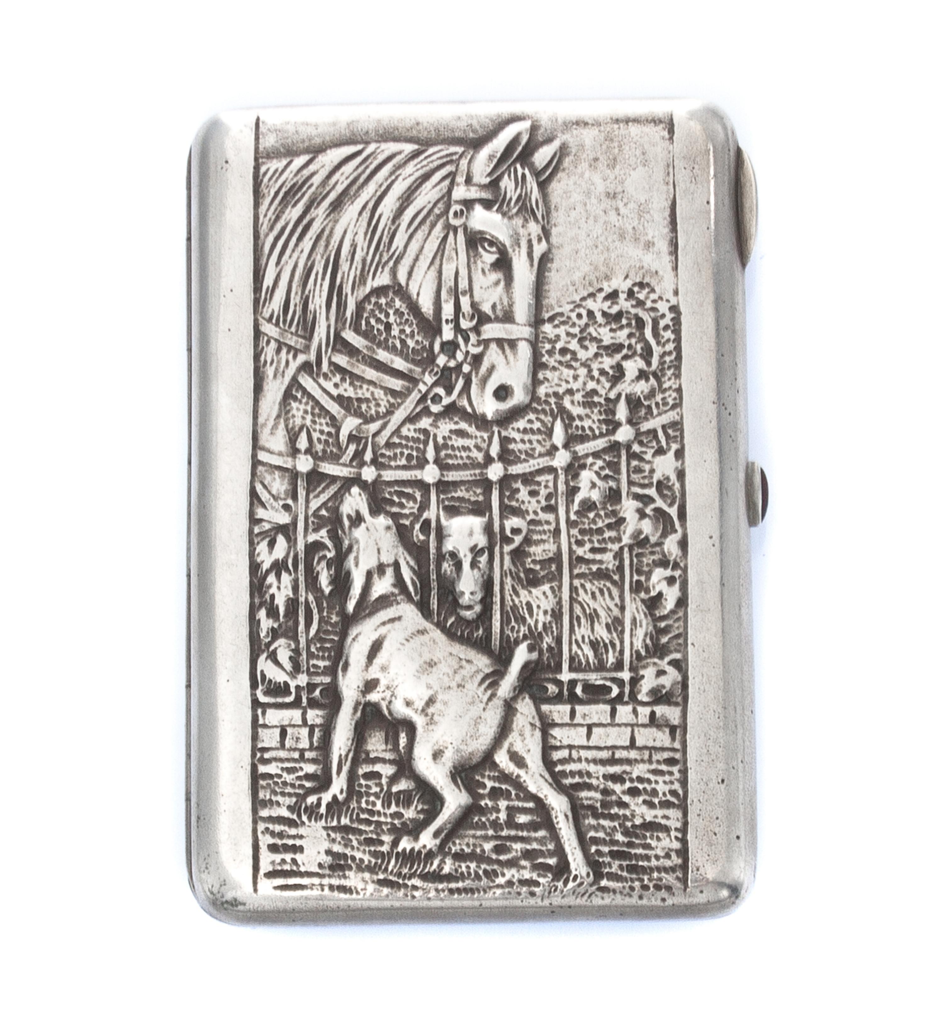 A Russian Silver Cigarette Case, Maker's Mark Cyrillic CF, obscured Artel mark, Moscow, the lid worked to show a dog, horse and sheep a