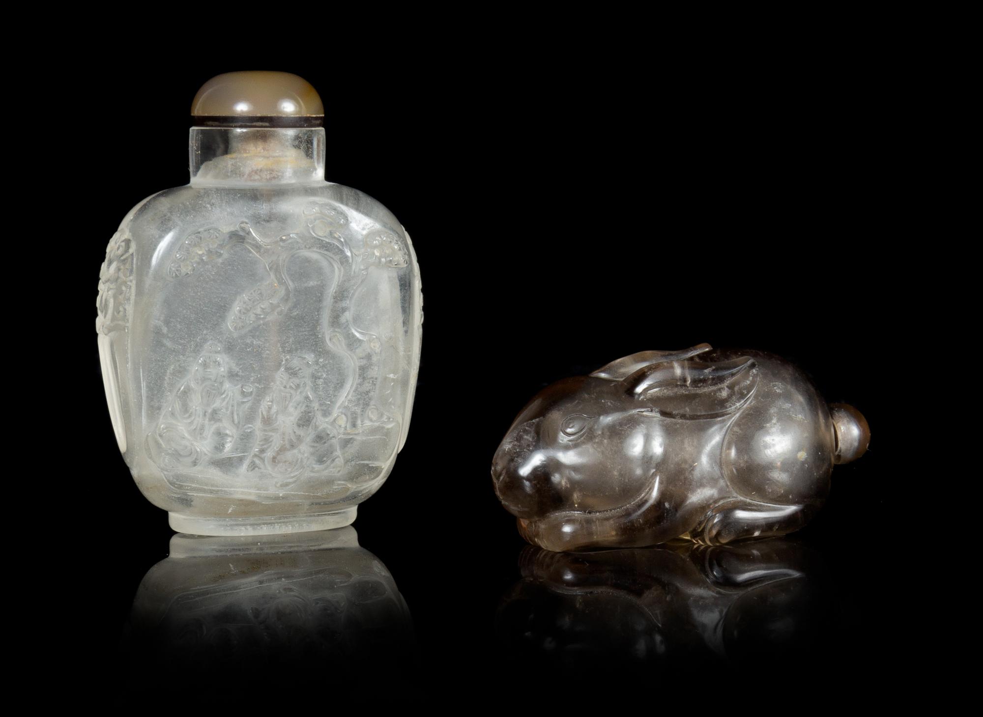 Two Carved Hardstone Snuff Bottles Height of taller 2 3/4 inches.