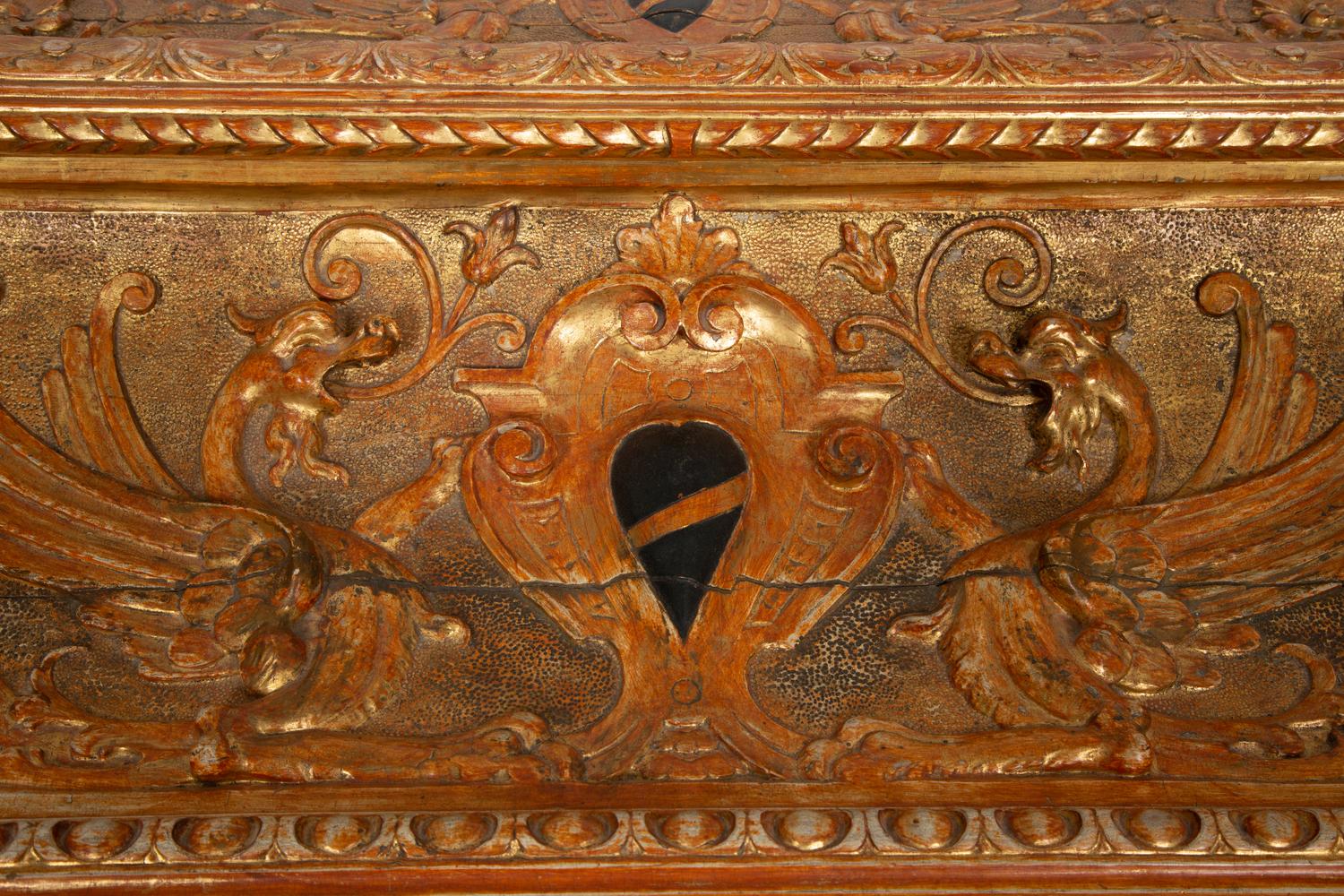 An Italian Renaissance Style Carved, Painted and Parcel Gilt Cassone