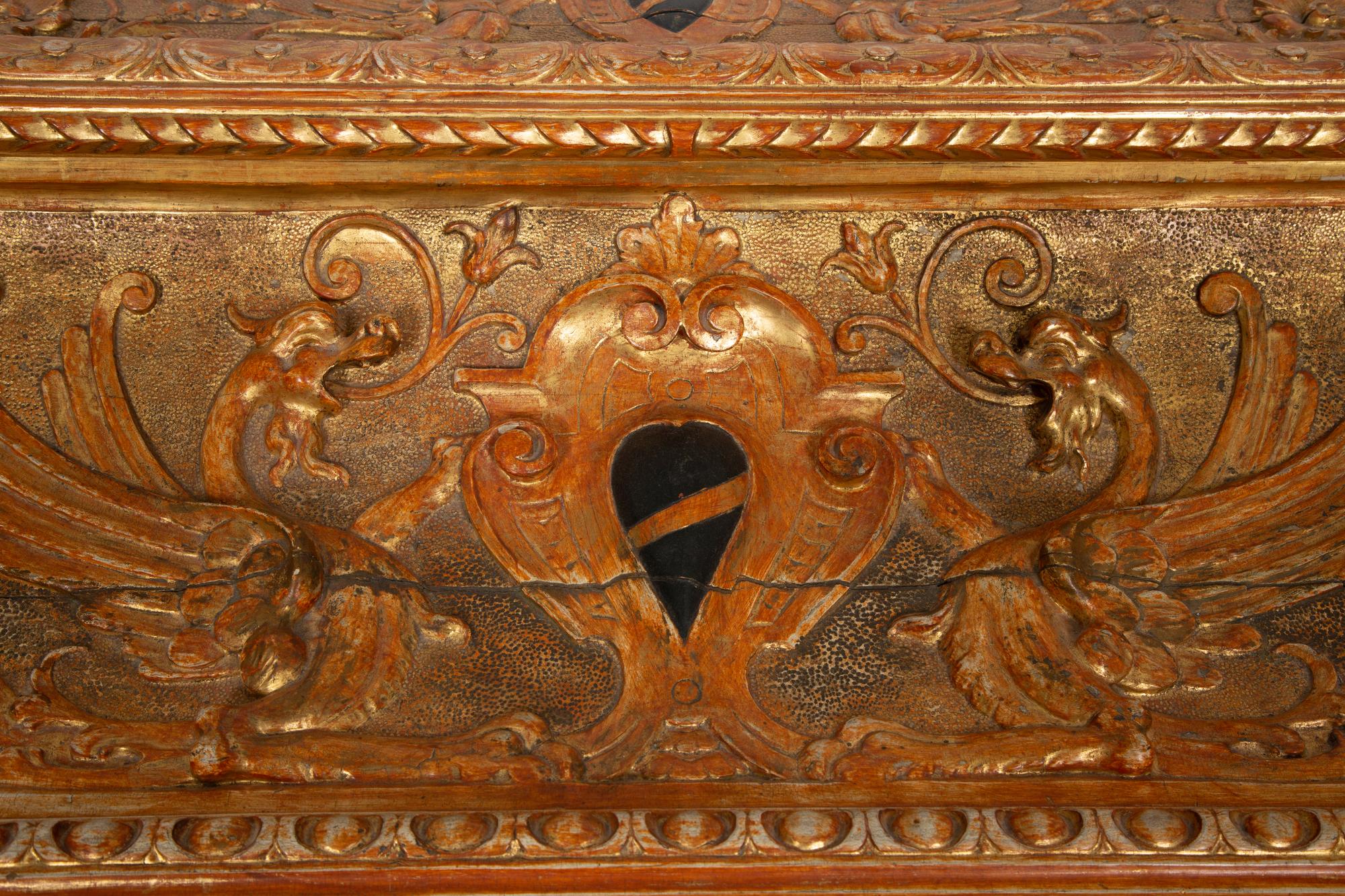 An Italian Renaissance Style Carved, Painted and Parcel Gilt Cassone