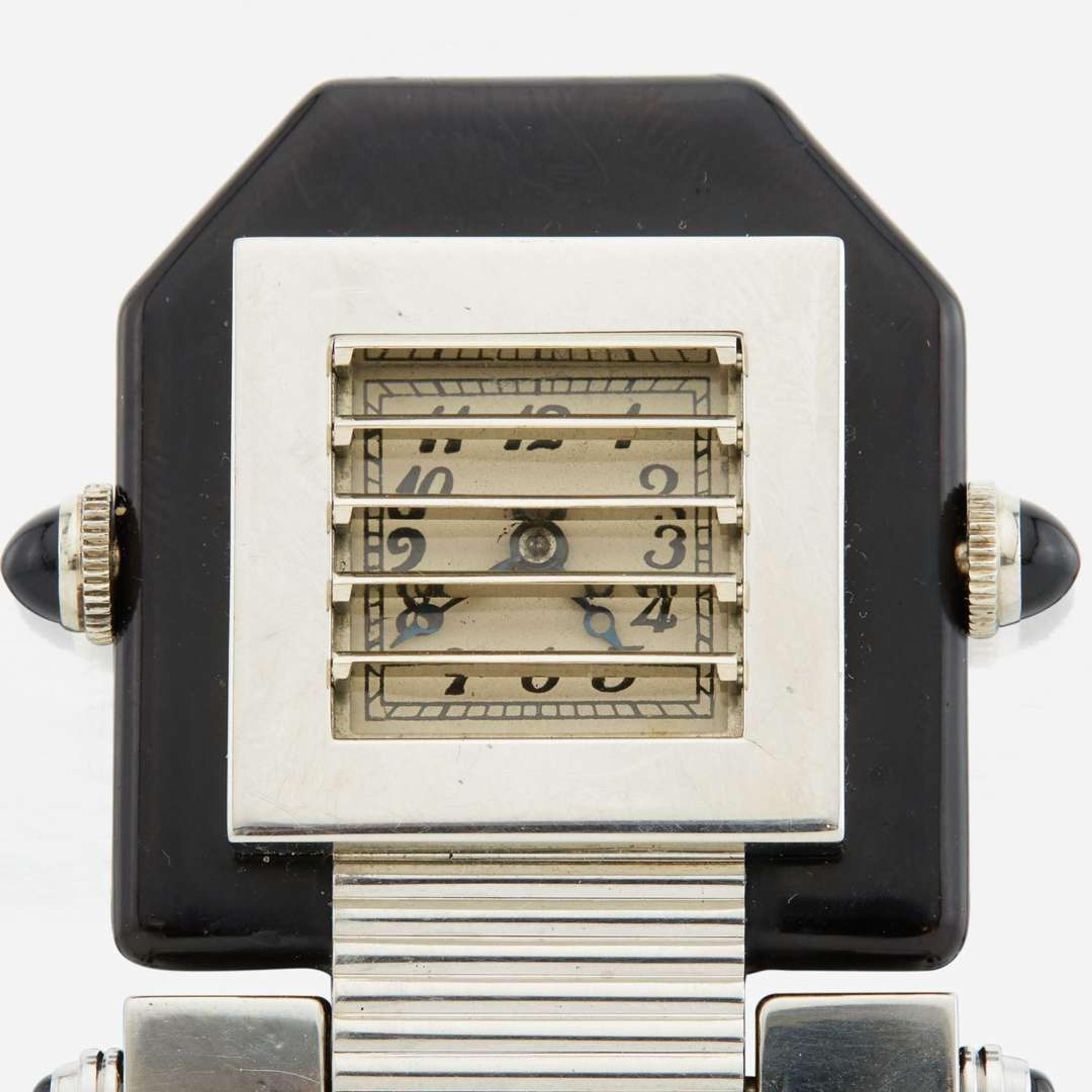An Art Deco pin shutter gold watch, Verger Feres Louvre