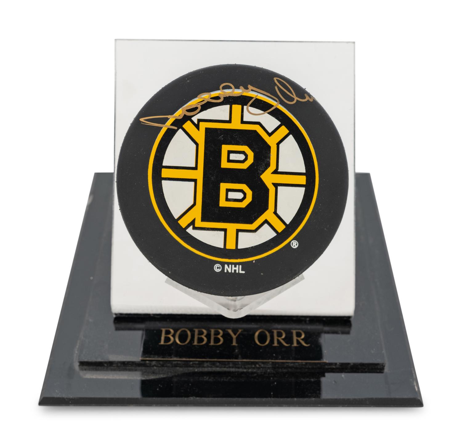 A Group of Bobby Orr and Gordie Howe Signed Autograph NHL Hockey Pucks,