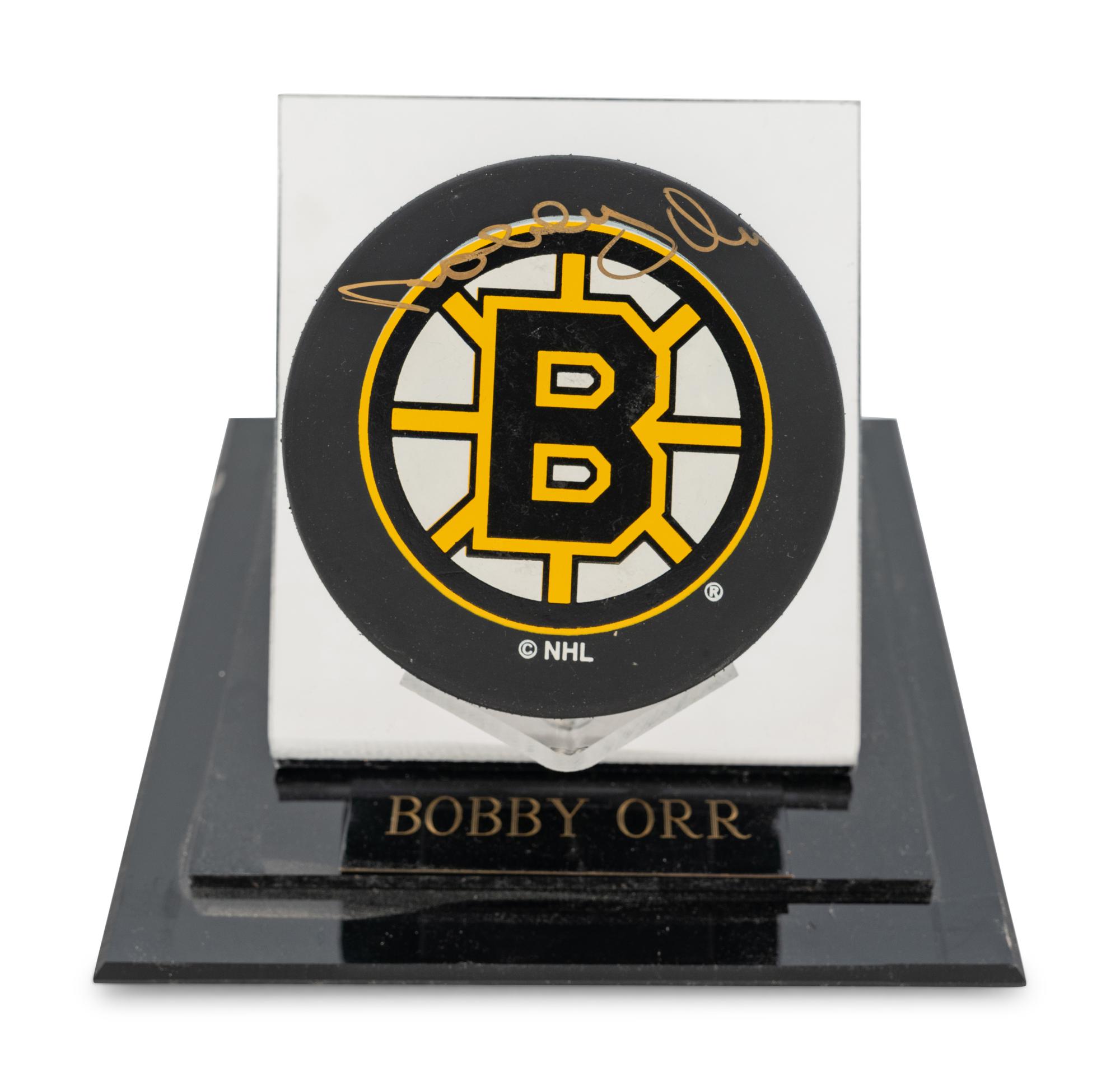 A Group of Bobby Orr and Gordie Howe Signed Autograph NHL Hockey Pucks,