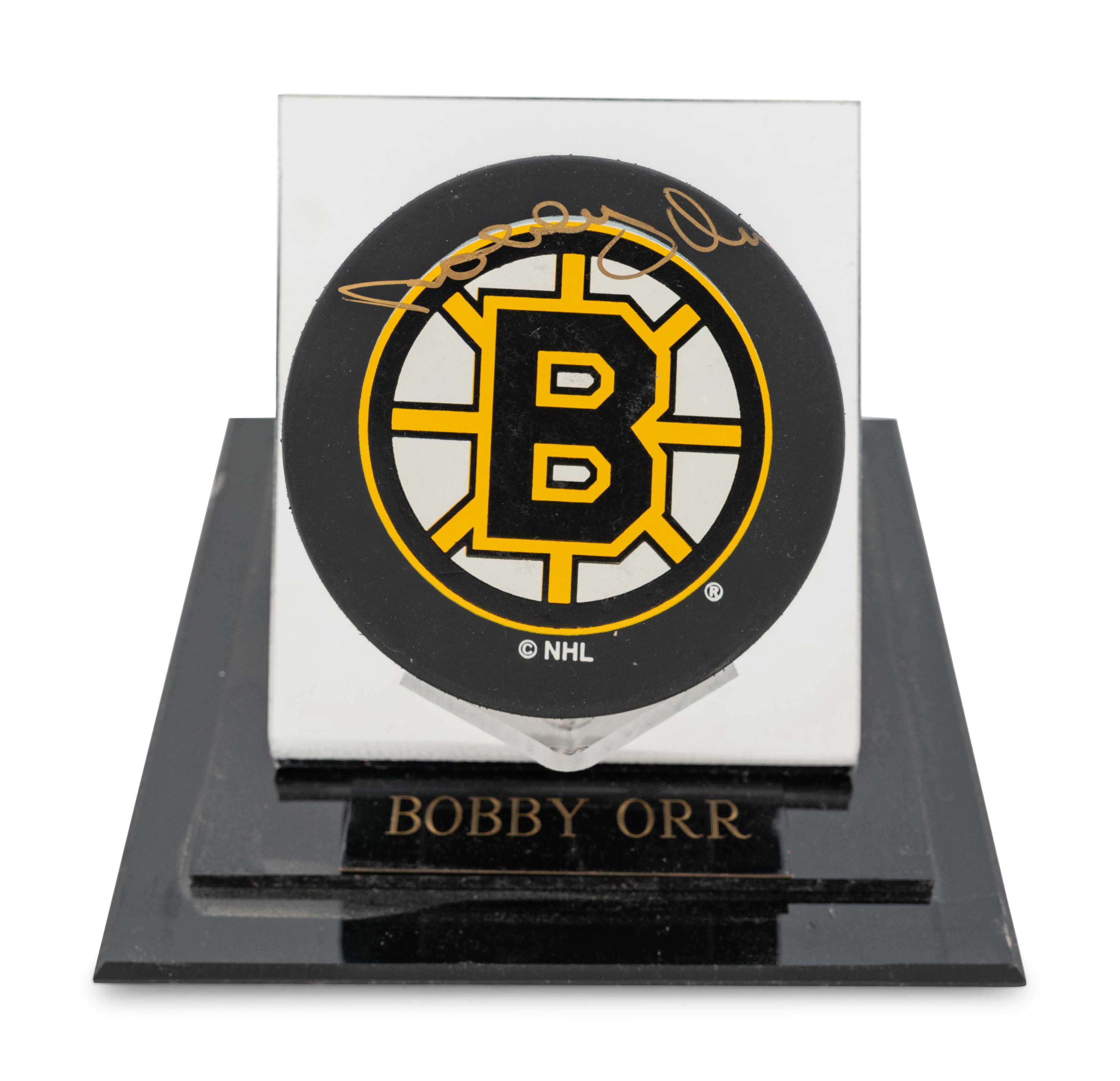A Group of Bobby Orr and Gordie Howe Signed Autograph NHL Hockey Pucks,