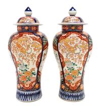 A Pair of Imari Porcelain Urns and Covers, Height 13 1/2 inches.