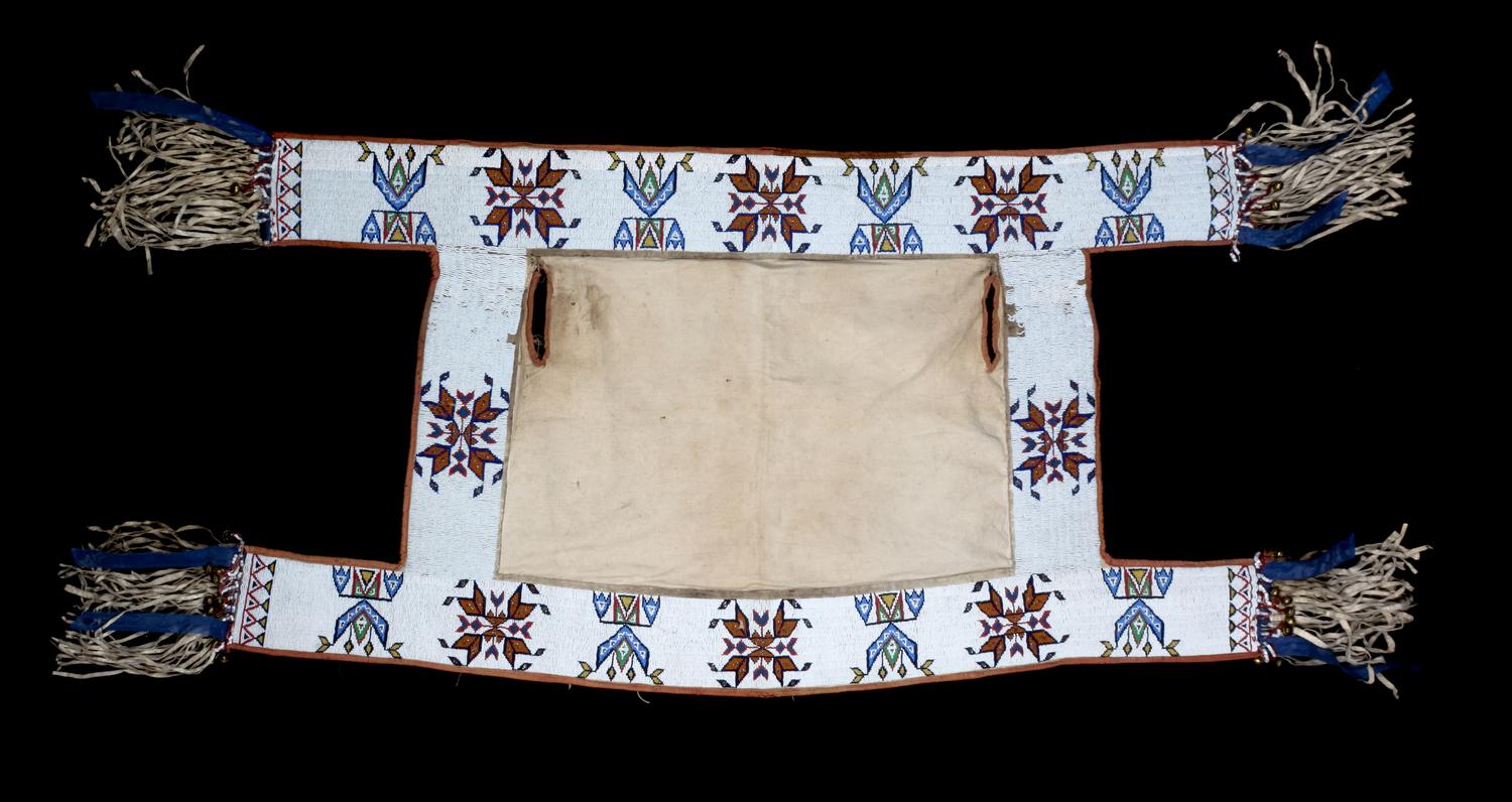 A Sioux Beaded Canvas Saddle Blanket Length approximately 55 1/2 x width27 inches.