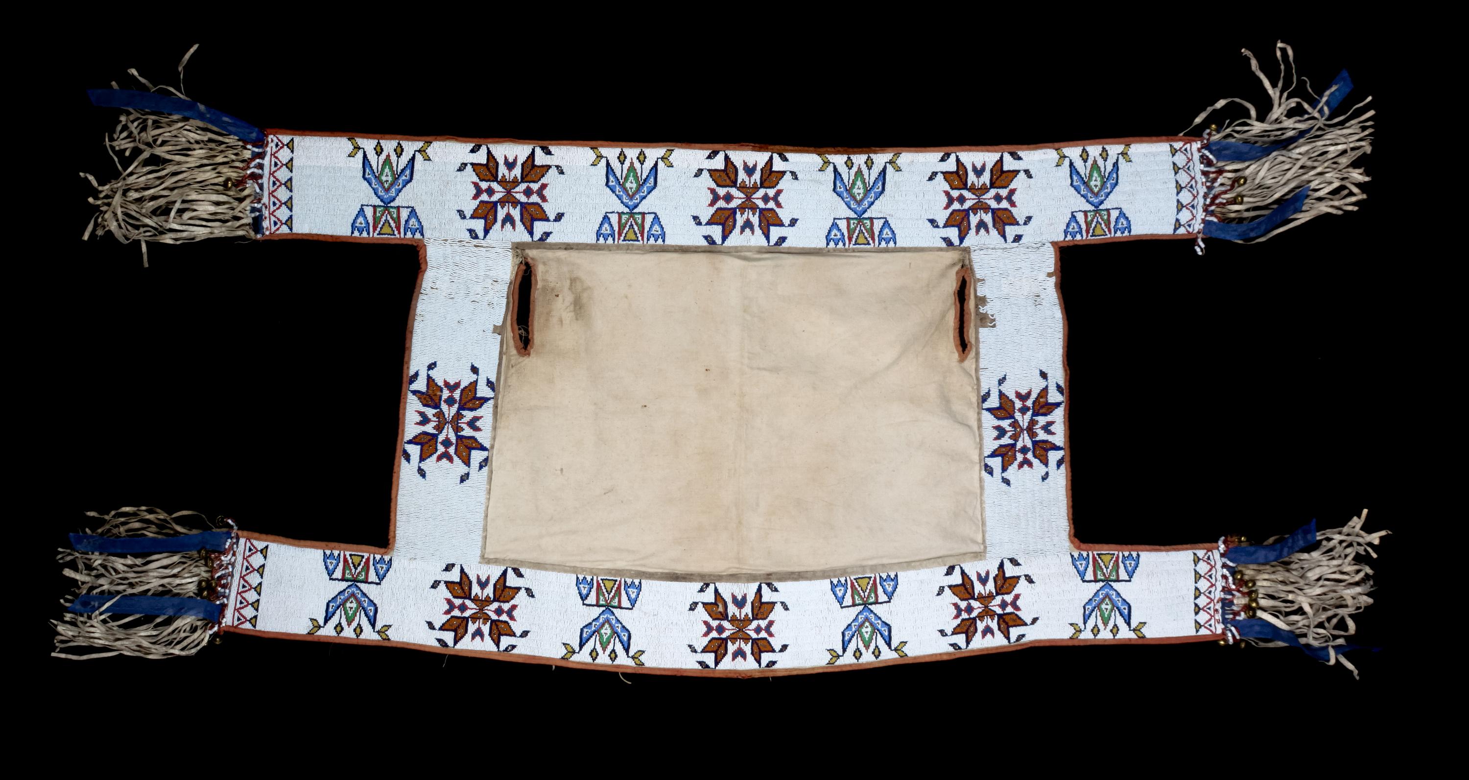 A Sioux Beaded Canvas Saddle Blanket Length approximately 55 1/2 x width27 inches.