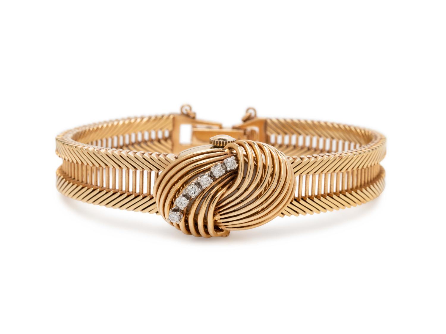 YELLOW GOLD AND DIAMOND SURPRISE WRISTWATCH