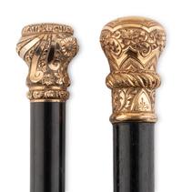 Two Gold or Gilt Metal Mounted Walking Sticks