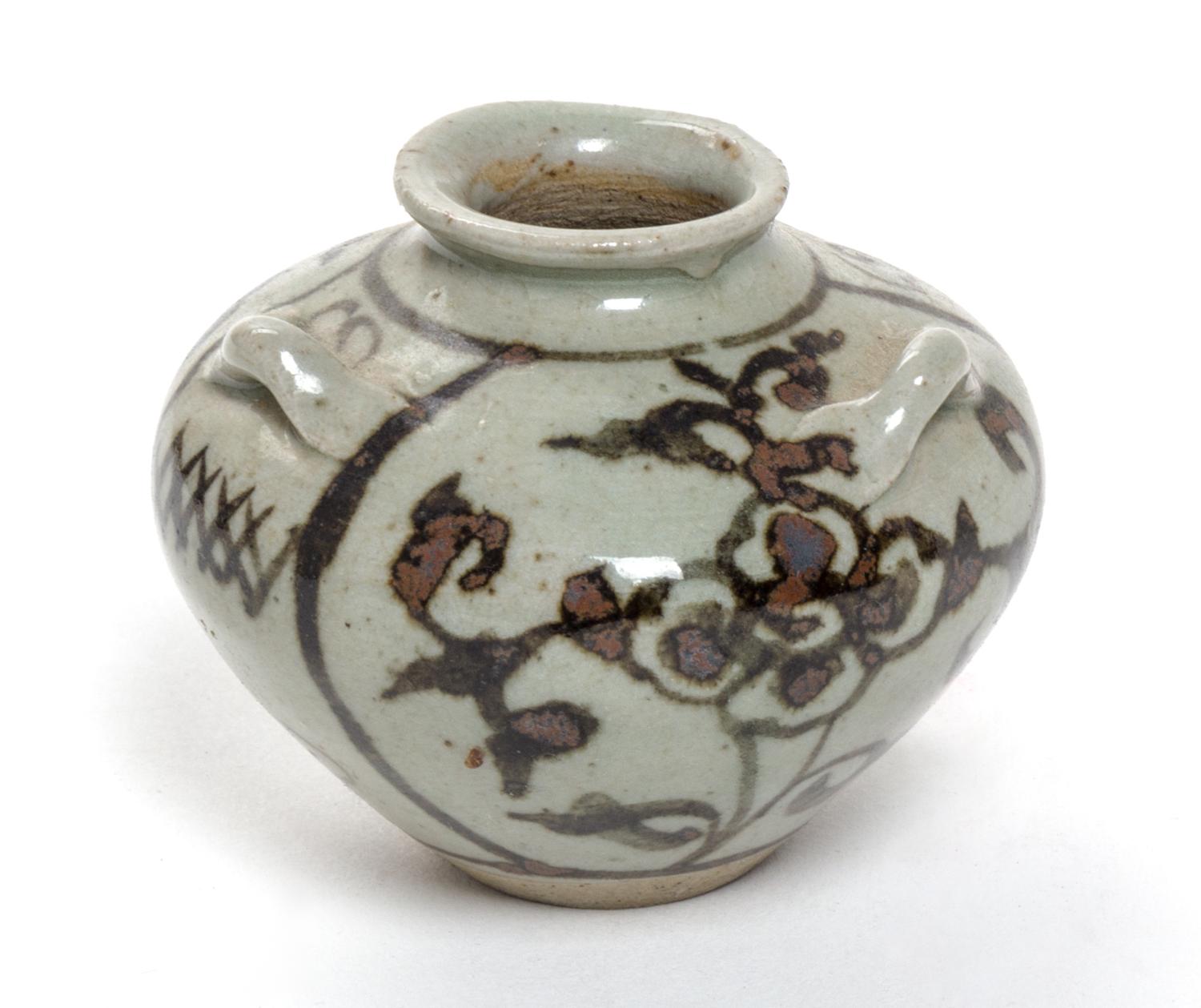 A Small Brown Glazed Pottery Water Dropper Height 2 1/4 inches.