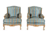 A Pair of Louis XV Style Painted and Parcel Gilt Bergeres