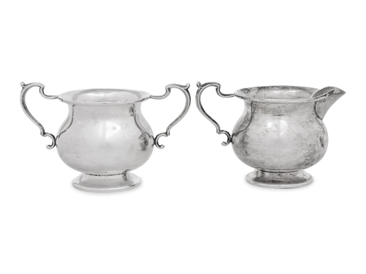 A Pair of English Silver Sauce Boats and an American Silver Sugar and Creamer Set