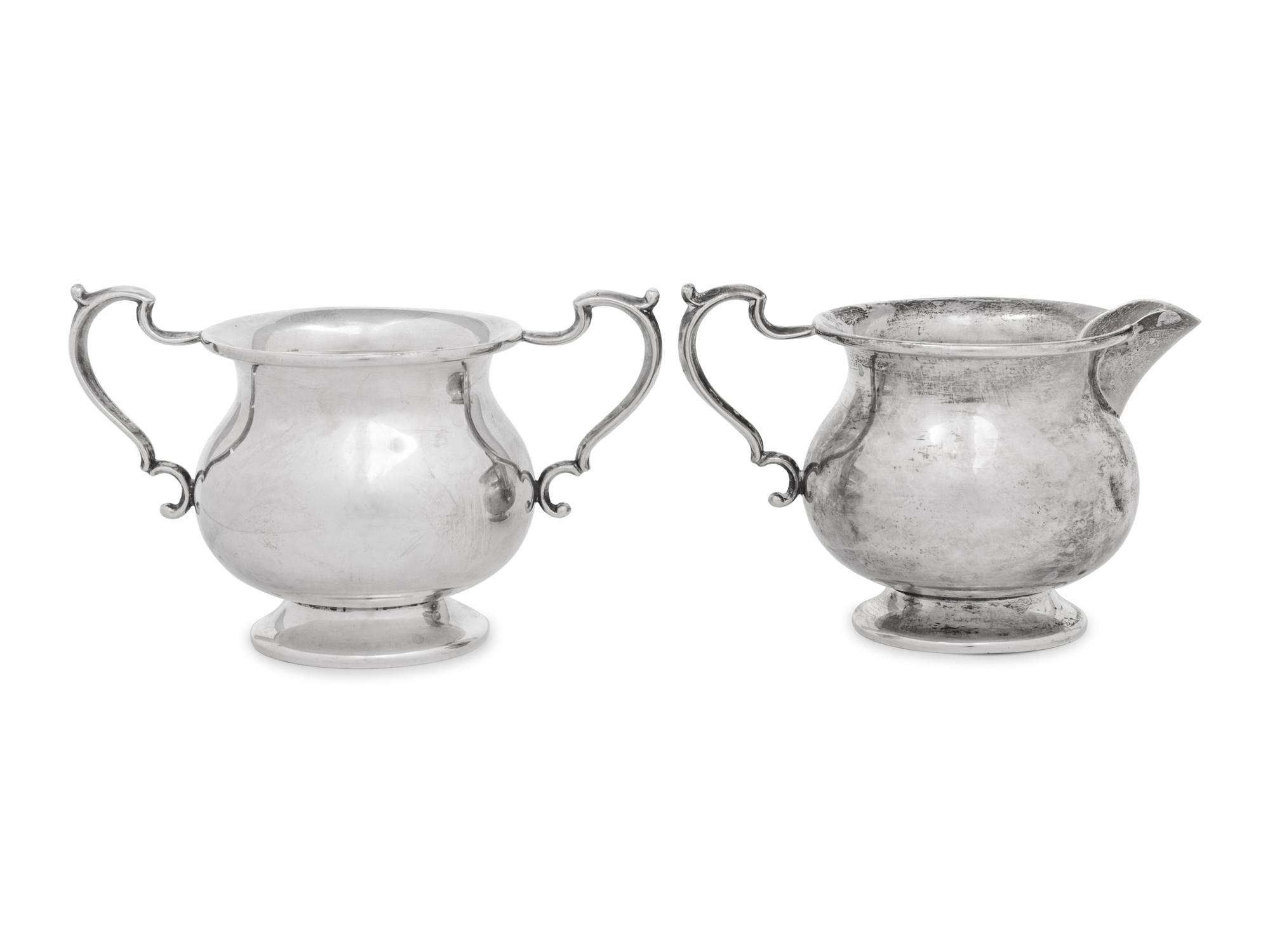 A Pair of English Silver Sauce Boats and an American Silver Sugar and Creamer Set
